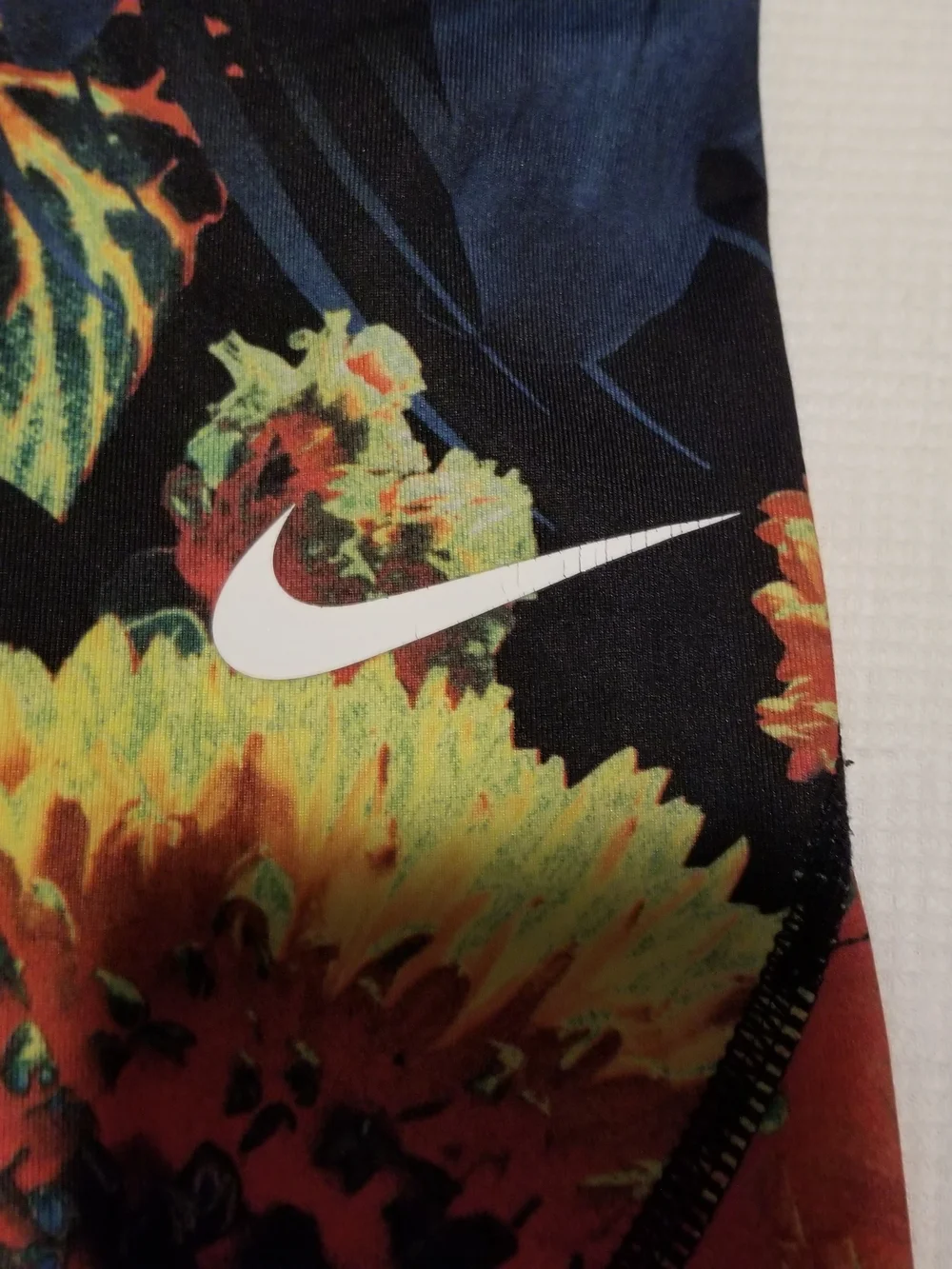 Nike Pro Girl's Small Black With Blue, Orange, & Yellow Floral Print Leggings